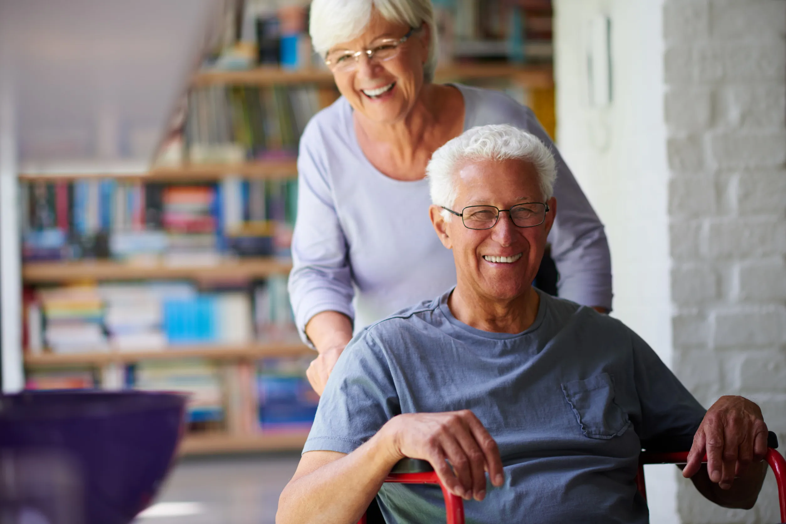Nurse having conversation with african american senior man